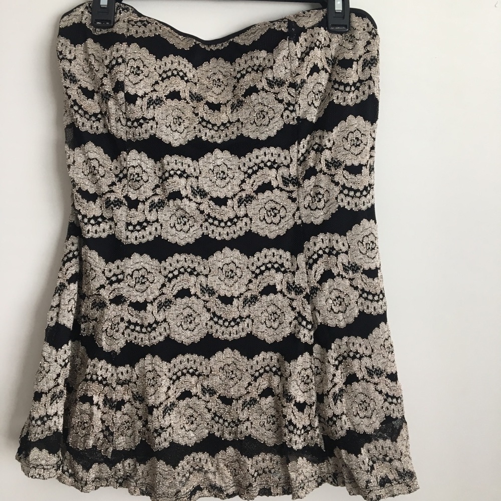 Black and gold top